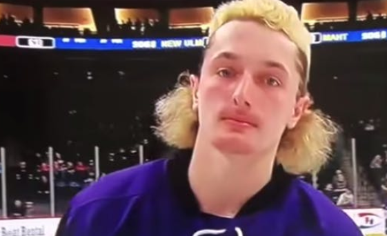 A shot from the   Game on! Minnesota All Hockey Hair Team. (YouTube)