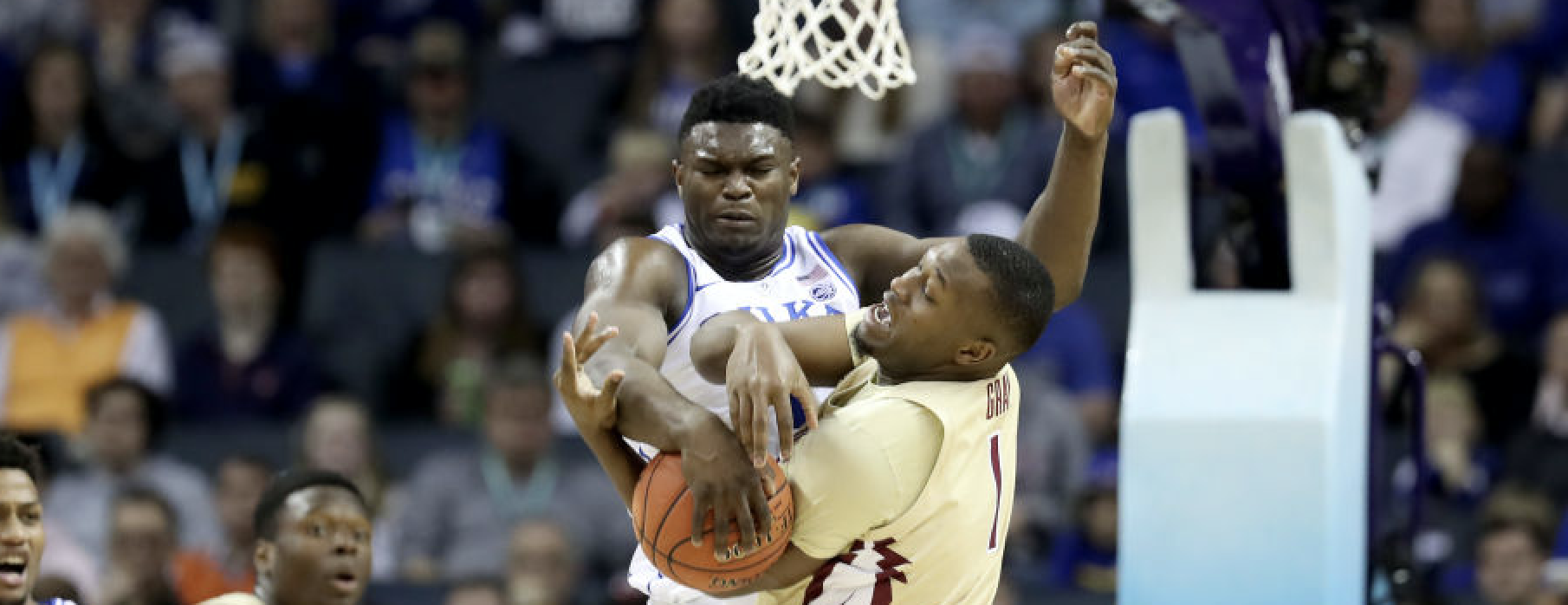 Zion Williamson blocks a shot by Raiquan Gray (Photo by Streeter Lecka/Getty Images)