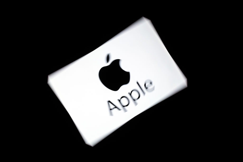 The Apple logo displayed on a tablet. (LIONEL BONAVENTURE/AFP/Getty Images)