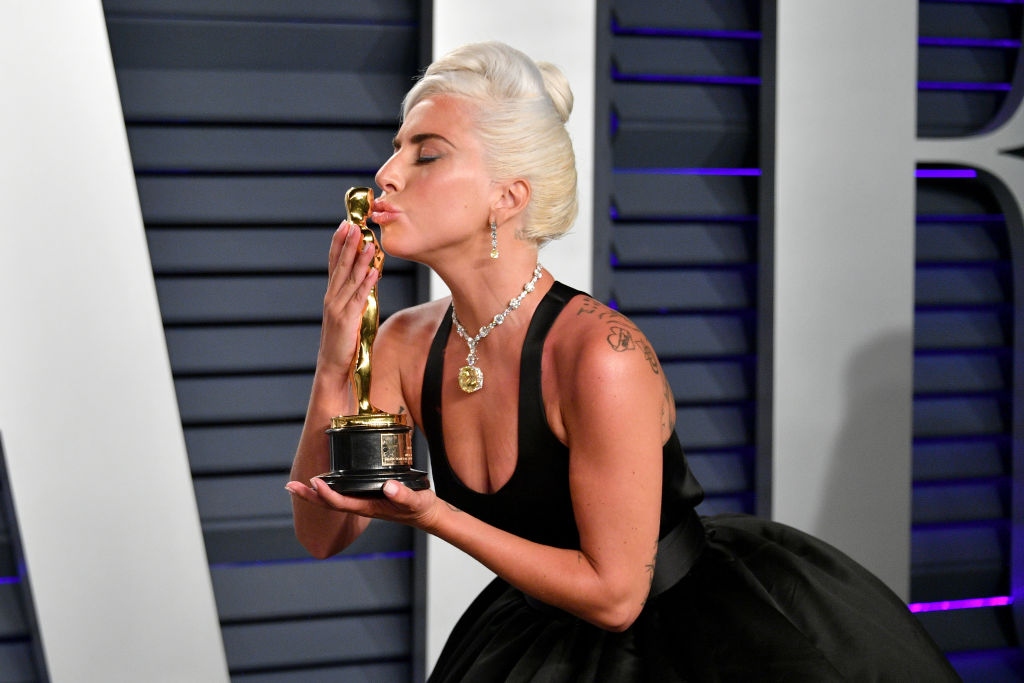  Lady Gaga with an Oscar. (Photo by Dia Dipasupil/Getty Images)