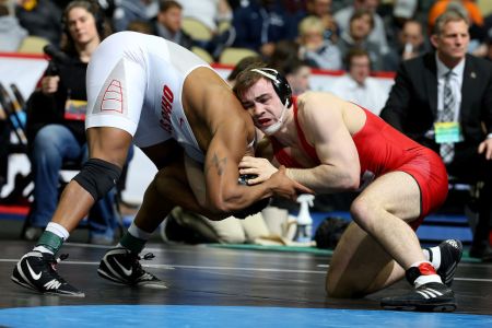 Maxwell Dean of the Cornell Big Red wrestles Myles Martin of OSU. (Photo by Justin K. Aller/NCAA Photos via Getty Images)