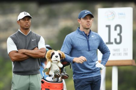 Tiger Woods and Rory McIlroy. (Photo by Ezra Shaw/Getty Images)