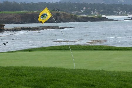 The flagstick on the 18th hole at Pebble Beach. (Photo by Stephen Dunn/Getty Images)
