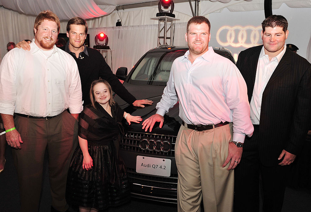 Tom Brady and his linemen with Katie Meade at the Best Buddies reception in May 2008. (Steve Jennings/WireImage)