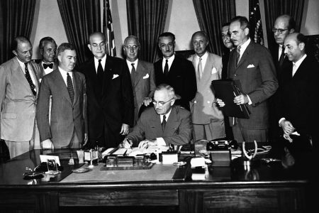 President Harry S. Truman signs the North Atlantic Pact (CORBIS/Corbis via Getty Images)