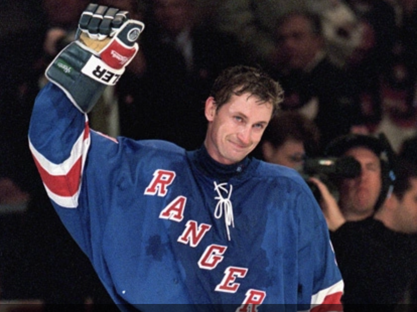 Wayne Gretzky waves to the crowd in his last NHL game. (Ezra Shaw/Getty Images)