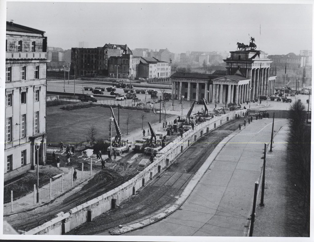 November 1961. East Germans fortify the border at the Brandenburg Gate, Berlin, expanding the concrete wall and adding a barbed-wire fence. (Photo credit: CIA archives)
