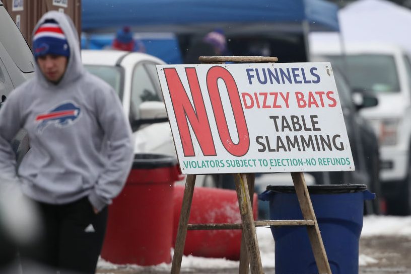 A sign notes the prohibiting table slamming. (Tom Szczerbowski/Getty)
