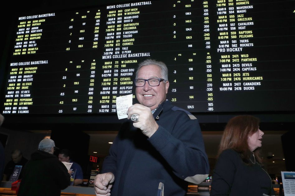 Ron Jaworski places the first bet at the William Hill Sports Book in Atlantic City. (Bennett Raglin/Getty)