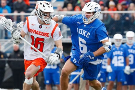 Brendan Curry of Syracuse plays John Prendergast of Duke. (Rich Barnes/Getty)