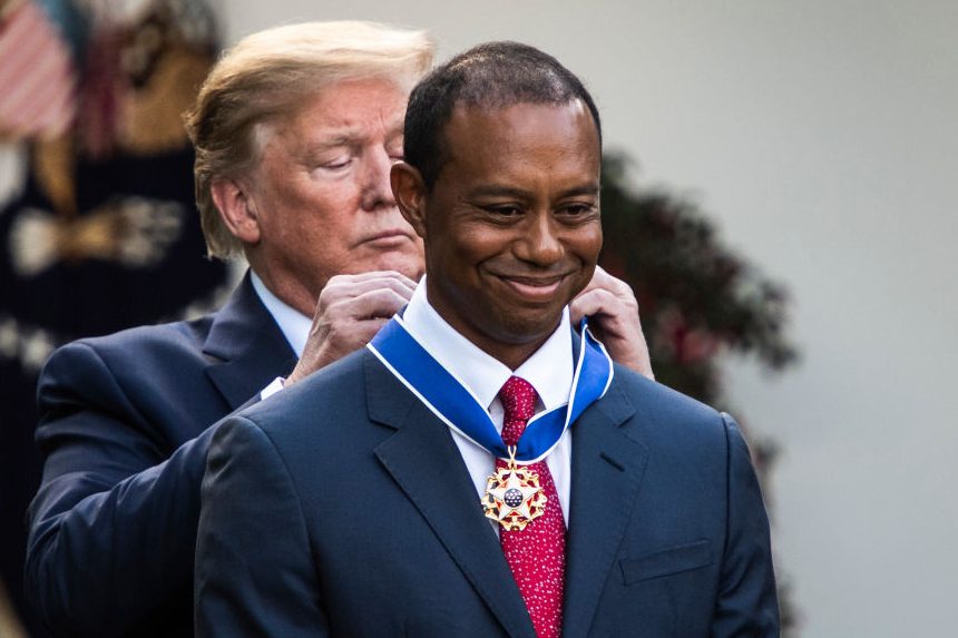 President Trump presents the Presidential Medal of Freedom to Tiger Woods. (Jabin Botsford/The Washington Post via Getty Images)