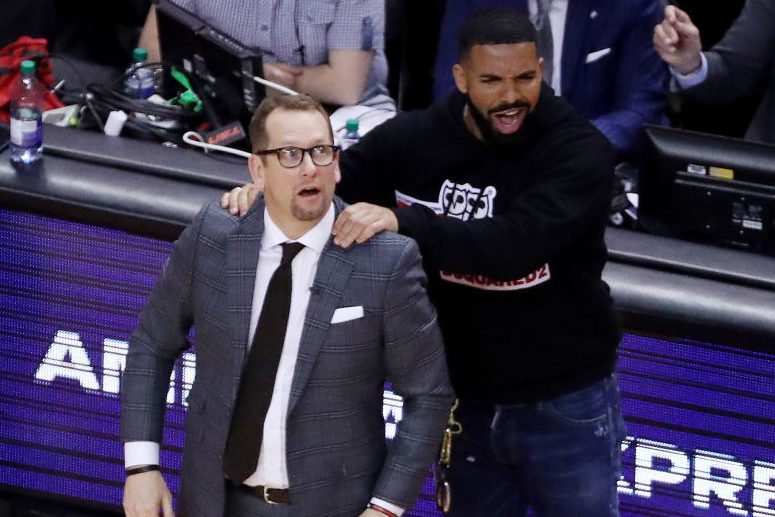 Drake massages Toronto Raptors head coach Nick Nurse. (Steve Russell/Toronto Star via Getty)
