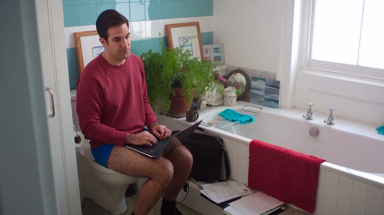 Comedian Rob Delaney, seen here in "Catastrophe", is a proponent of the toilet meeting