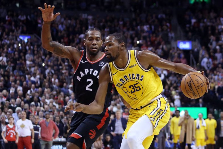 Kevin Durant being defended by Kawhi Leonard. (Vaughn Ridley/Getty)