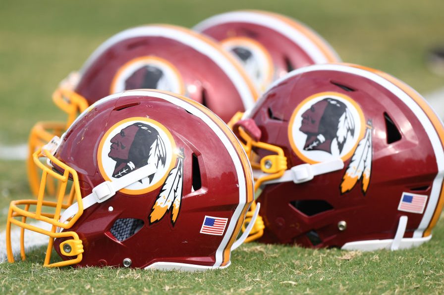 Football helmets on the field at the Washington Redskins training camp