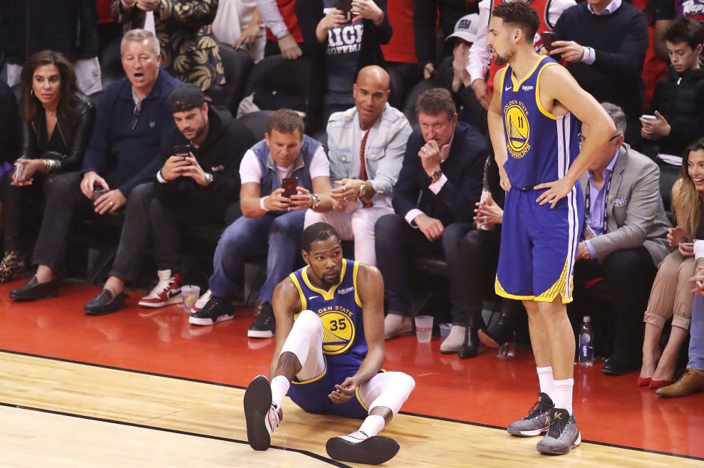 Kevin Durant reacts after sustaining an injury. (Claus Andersen/Getty)