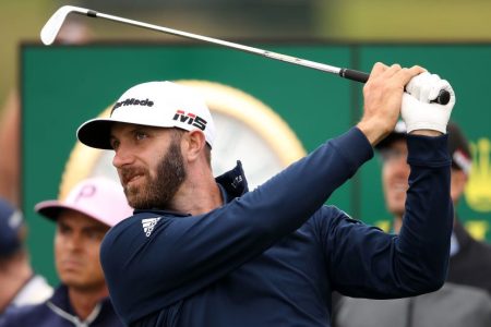 Dustin Johnson plays during a practice round. (Christian Petersen/Getty)