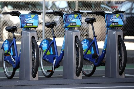 Ford GoBikes sit in a dock in San Francisco. (Justin Sullivan/Getty)