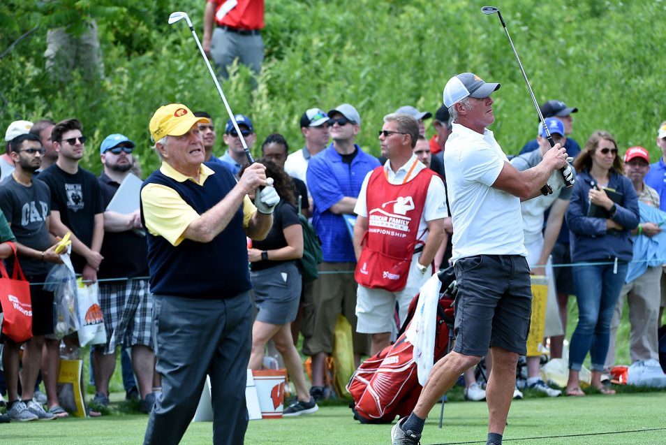 Jack Nicklaus warms up with Brett Favre at the American Family Insurance Championship. (Steve Dykes/Getty Images)