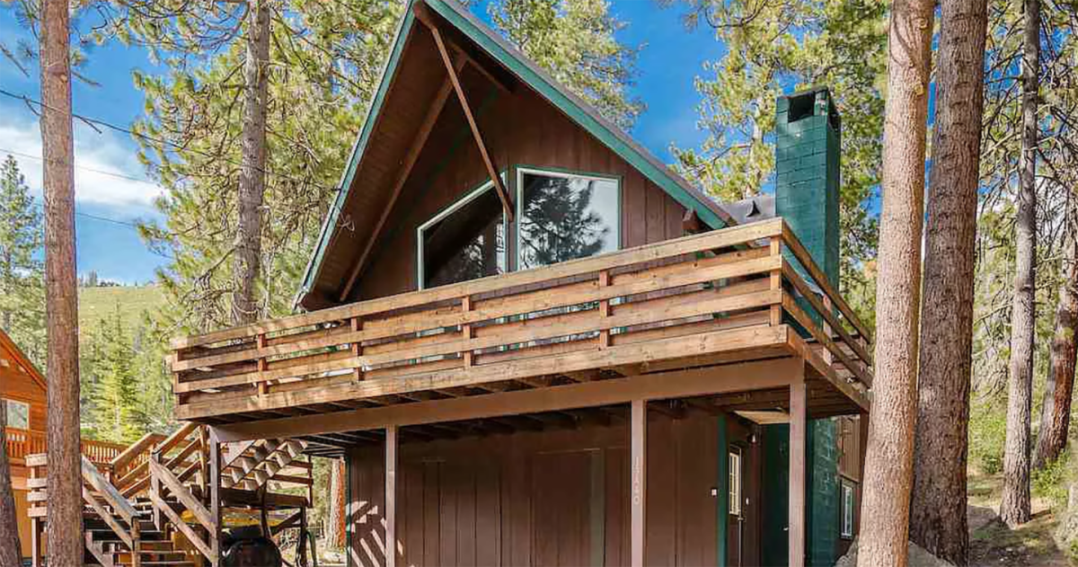 Spend your summer lakeside with three bedrooms and a giant deck