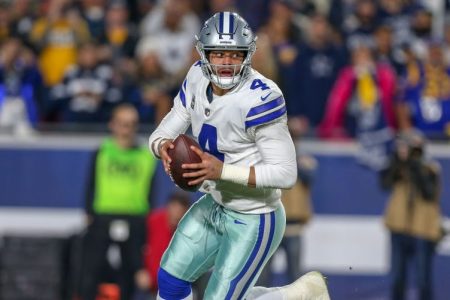 Dallas Cowboys quarterback Dak Prescott rolls out of the pocket. (Jordon Kelly/Icon Sportswire via Getty)