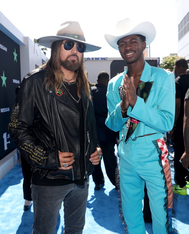 LOS ANGELES, CALIFORNIA - JUNE 23: Billy Ray Cyrus (L) and Lil Nas X attend the 2019 BET Awards at Microsoft Theater on June 23, 2019 in Los Angeles, California. (Photo by Johnny Nunez/Getty Images)