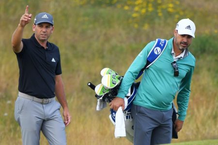 Sergio Garcia threw a club at this caddie Victor Garcia.
