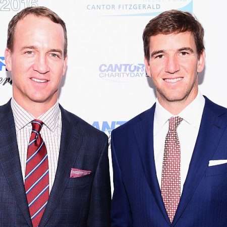 Peyton Manning and Eli Manning in 2016. (Dave Kotinsky/Getty Images for Cantor Fitzgerald)