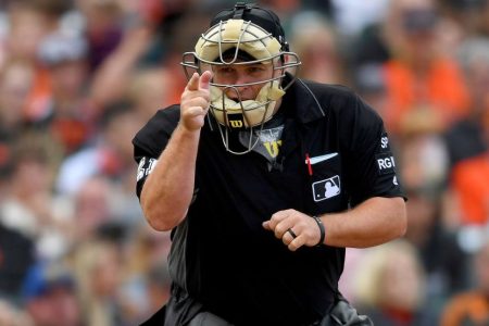 Umpire calling balls and strikes