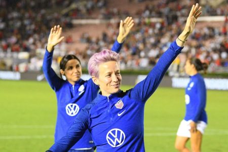 Megan Rapinoe with Alex Morgan.