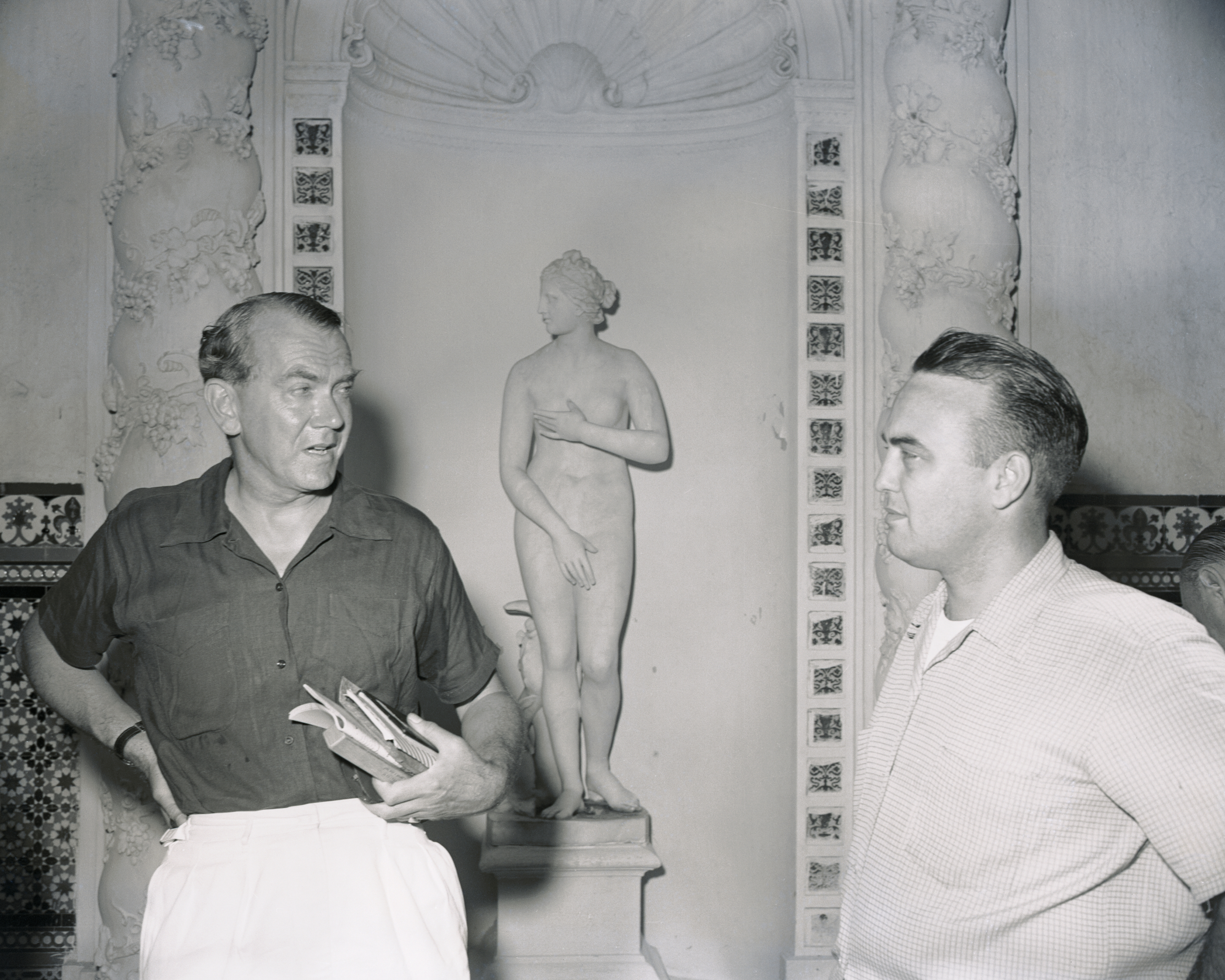 Graham Greene Talking with John Young (Bettmann / Contributor)