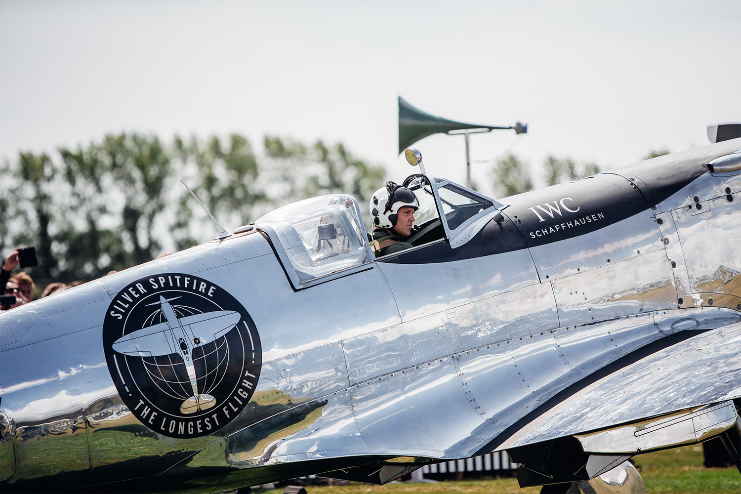 WWII Silver Spitfire Airplane at Goodwood Aerodrome