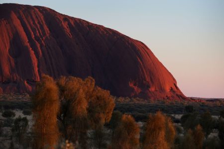 A general view of Uluru as seen from the designated sunrise viewing area in the Uluru-Kata Tjuta National Park, Australia. The Uluru-Kata Tjuta National Park board decided unanimously that the climb will close permanently on October 26, 2019. (Photo by Lisa Maree Williams/Getty Images)