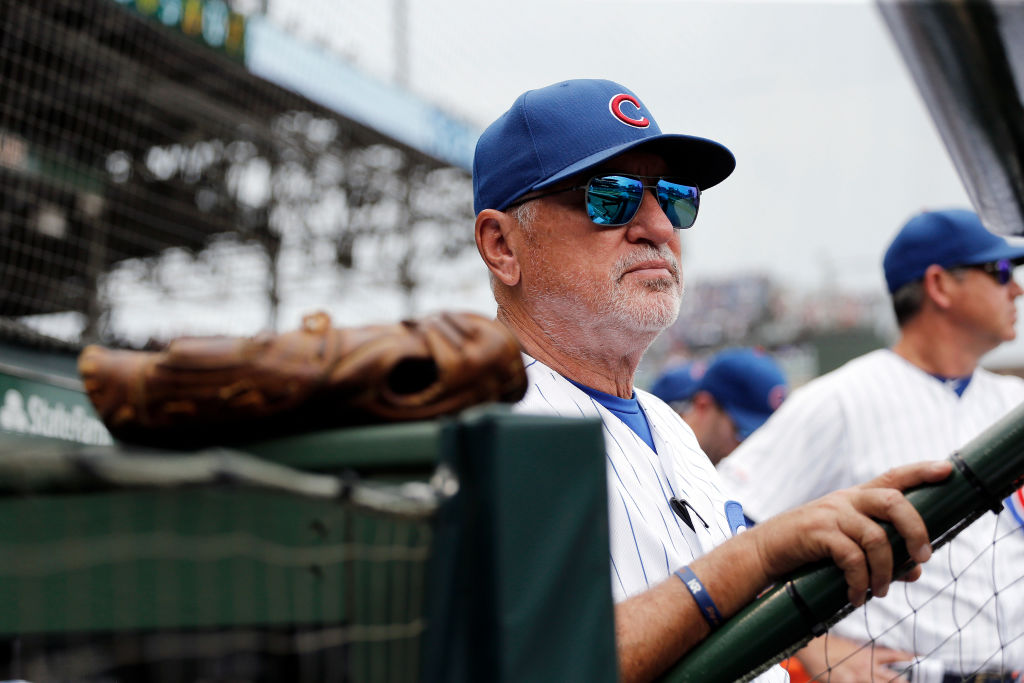 Manager Joe Maddon of the Chicago Cubs stands in the dugout during the game  against the St. Louis Cardinals at Wrigley Field on September 21, 2019 in Chicago, Illinois. (Photo by Nuccio DiNuzzo/Getty Images)