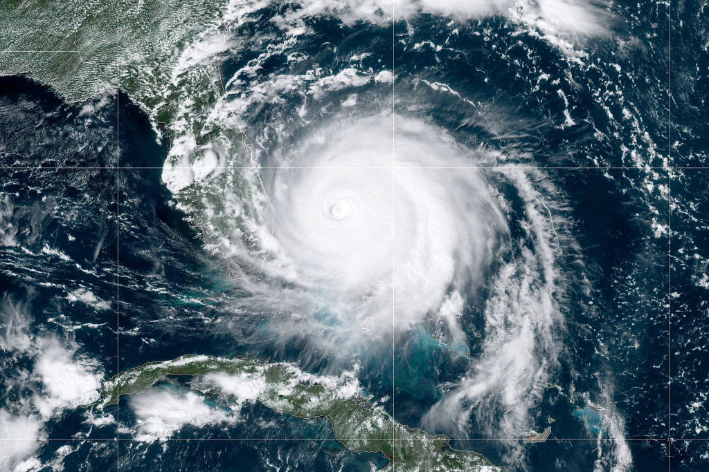 Hurricane Dorian, now a Cat. 4 storm, moves slowly past Grand Bahama Island on September 2, 2019