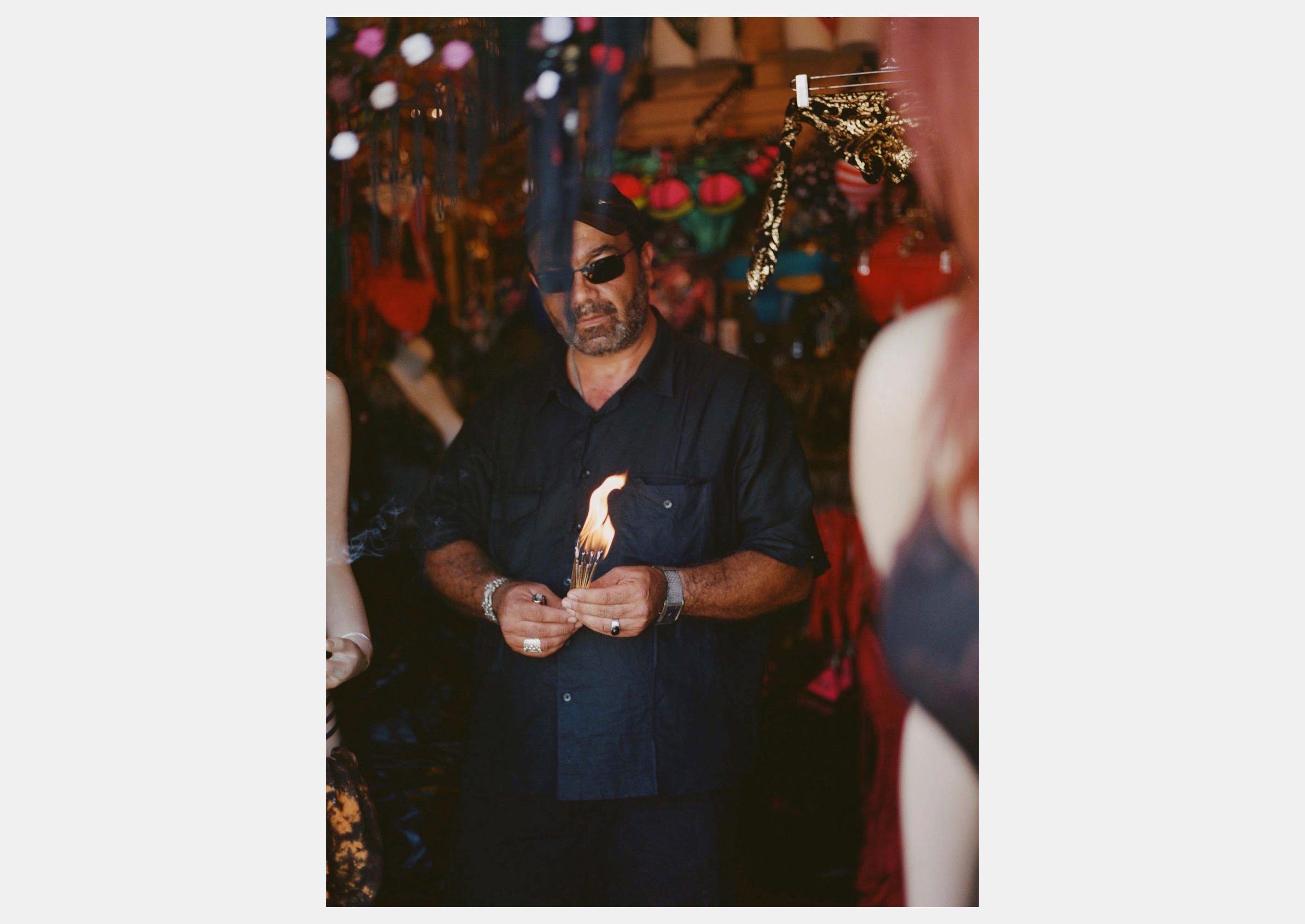 man holding incense la ben pier