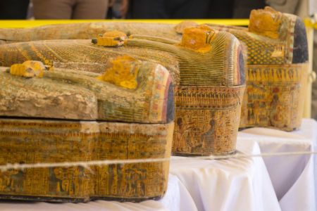 A photograph taken on October 19, 2019 shows sarchophagi displayed in front of Hatshepsut Temple in Egypt's valley of the Kings in Luxor - Egypt revealed today a rare trove of 30 ancient wooden coffins that have been well-preserved over millennia in the archaeologically rich Valley of the Kings in Luxor.(Photo by Khaled DESOUKI / AFP) (Photo by KHALED DESOUKI/AFP via Getty Images)