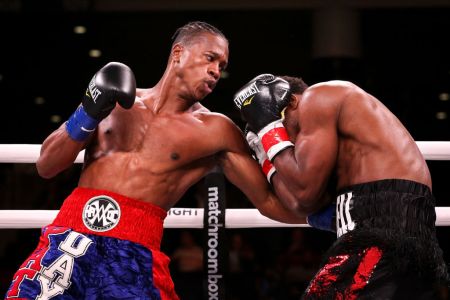 Patrick Day (L) lands a punch on Charles Conwell in the first round of their Super-Welterweight bout at Wintrust Arena on October 12, 2019 in Chicago, Illinois. (Photo by Dylan Buell/Getty Images)