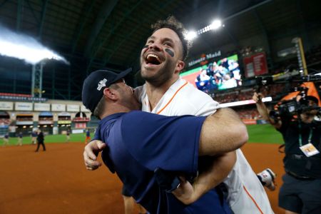 Jose Altuve of the Houston Astros is congratulated by his teammate Justin Verlander following his ninth inning walk-off two-run home run to defeat the New York Yankees 6-4 in game six of the American League Championship Series at Minute Maid Park on October 19, 2019 in Houston, Texas. The Astros defeated the Yankees 6-4. (Photo by Elsa/Getty Images)