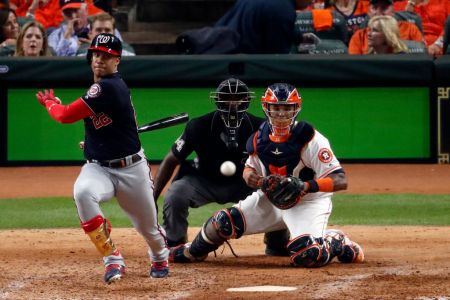 Juan Soto of the Washington Nationals singles against the Houston Astros during the eighth inning in Game One of the 2019 World Series at Minute Maid Park on October 22, 2019 in Houston, Texas. (Photo by Tim Warner/Getty Images)