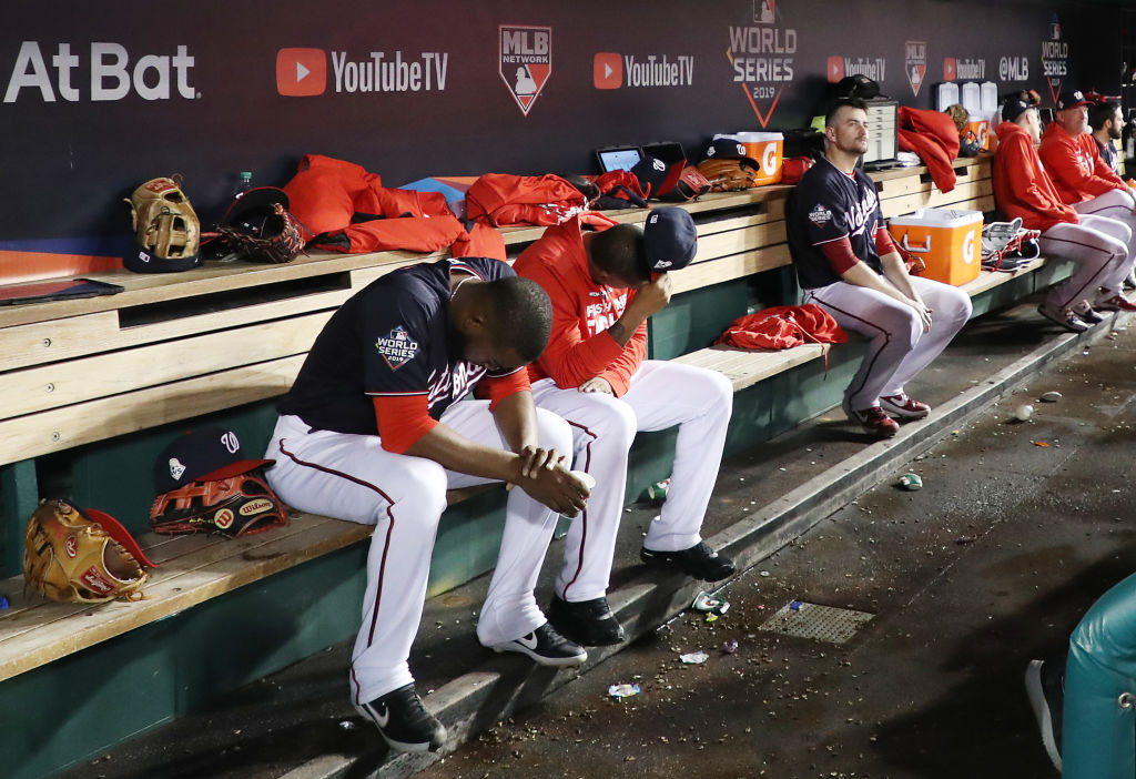 The Washington Nationals react against the Houston Astros during the ninth inning in Game Five of the 2019 World Series at Nationals Park on October 27, 2019 in Washington, DC. (Photo by Rob Carr/Getty Images)