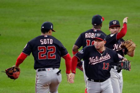 Asdrubal Cabrera and Juan Soto of the Washington Nationals celebrate their teams 7-2 win against the Houston Astros in Game Six of the 2019 World Series at Minute Maid Park on October 29, 2019 in Houston, Texas. (Photo by Tim Warner/Getty Images)
