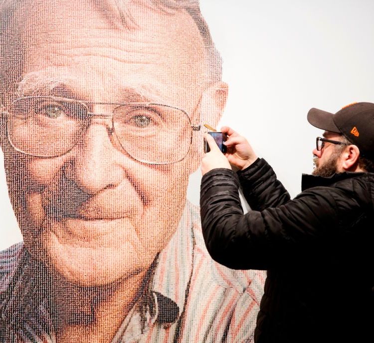 A visitor takes a mobile photo of a picture of Ingvar Kamprad, founder of Swedish multinational furniture retailer IKEA, at the IKEA museum in Almhult, Sweden, on January 28, 2018. (OLA TORKELSSON/AFP/Getty Images)