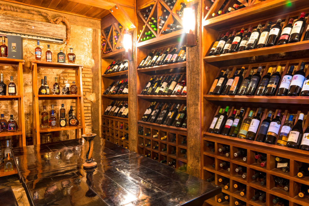Wine cellar at the 'Tavern of the 7 Juanes'. The famous place sells a great variety of wines in the small colonial village. (Photo by Roberto Machado Noa/LightRocket via Getty Images)