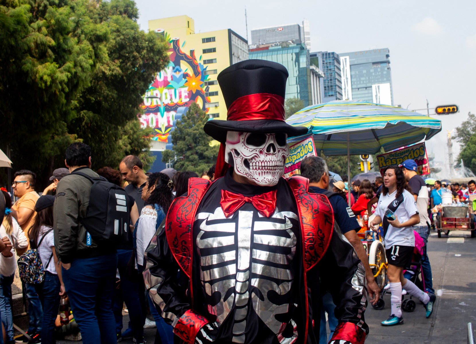 Reforma, one of the main avenues in the city, shuts down for numerous parades during Día de Muertos, and people come out in full force — some to watch, and others, like this guy, to be watched. 
