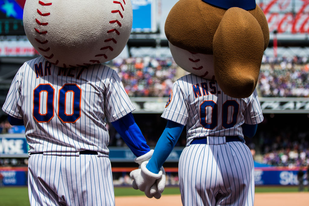 Mr and Mrs Met hold hands during the seventh inning stretch during the game between the New York Mets and the Arizona Diamondbacks at Citi Field on Sunday May 20, 2018 in the Queens borough of New York City. (Photo by Rob Tringali/MLB via Getty Images)