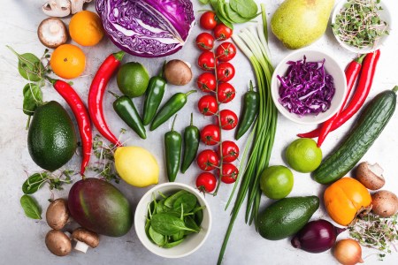 Selection of fresh  vegetables and fruits viewed from above.