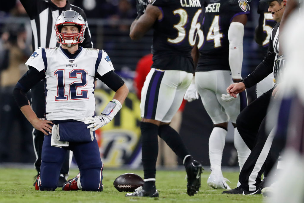 Quarterback Tom Brady of the New England Patriots reacts after being sacked against the Baltimore Ravens during the fourth quarter M&T Bank Stadium on November 3, 2019 in Baltimore, Maryland. (Photo by Scott Taetsch/Getty Images)