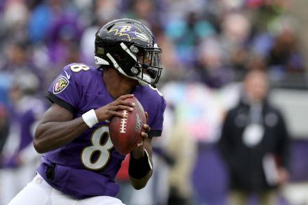 Quarterback Lamar Jackson of the Baltimore Ravens drops back to pass in the second half against the Houston Texans at M&T Bank Stadium on November 17, 2019 in Baltimore, Maryland. (Photo by Rob Carr/Getty Images)