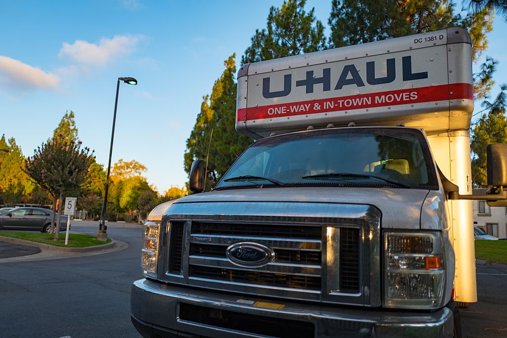 Front view of a U-Haul moving truck in the parking lot of an apartment complex in the San Francisco Bay Area, California, September 12, 2016. (Photo via Smith Collection/Gado/Getty Images).